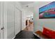 Inviting hallway with modern decor, striped walls, and wood floors at 1250 Parkwood Se Cir # 2114, Atlanta, GA 30339
