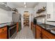 Well-organized kitchen with stainless steel appliances and decorative backsplash at 1250 Parkwood Se Cir # 2114, Atlanta, GA 30339