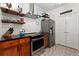 Modern kitchen featuring stainless steel appliances, dark countertops, and stylish backsplash and patterned flooring at 1250 Parkwood Se Cir # 2114, Atlanta, GA 30339