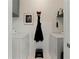 Functional laundry room equipped with modern appliances and ample storage space on the shelves at 1250 Parkwood Se Cir # 2114, Atlanta, GA 30339
