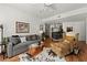 Spacious living room featuring hardwood floors, modern decor, and natural light at 1250 Parkwood Se Cir # 2114, Atlanta, GA 30339