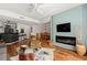 Stylish open living area with electric fireplace and hardwood flooring at 1250 Parkwood Se Cir # 2114, Atlanta, GA 30339