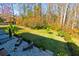 An aerial view of a backyard with well manicured lawn, landscaping, and a beautiful outdoor patio at 2845 Jims Ne Rd, Marietta, GA 30066