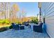 Backyard patio with luxurious wicker furniture, providing an ideal spot for relaxation and entertainment at 2845 Jims Ne Rd, Marietta, GA 30066