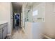 Bathroom featuring a glass enclosed shower with subway tiles, vanity and walk-in closet at 2845 Jims Ne Rd, Marietta, GA 30066