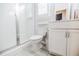 Clean bathroom features a glass enclosed shower, toilet and a white vanity with a mirror at 2845 Jims Ne Rd, Marietta, GA 30066
