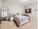 Bedroom with a cozy bed, soft carpet, a full length mirror, and UMBC banner creating a comfortable, homey atmosphere at 2845 Jims Ne Rd, Marietta, GA 30066