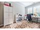 Bright home office features large windows, neutral walls, and built-in storage for efficient work space at 2845 Jims Ne Rd, Marietta, GA 30066