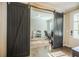 Stylish home office with sliding barn doors, a work desk, and plenty of natural light at 2845 Jims Ne Rd, Marietta, GA 30066