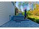 Backyard patio featuring a modern hot tub, set in a serene outdoor setting with lush greenery and tall trees at 2845 Jims Ne Rd, Marietta, GA 30066