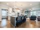 Open concept kitchen with a center island, stainless steel appliances, and seamless flow to the living area at 2845 Jims Ne Rd, Marietta, GA 30066