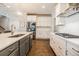 Well-appointed kitchen with a central island, stainless steel refrigerator, gas range, and stylish cabinetry at 2845 Jims Ne Rd, Marietta, GA 30066