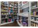 Walk-in pantry with custom shelving, organizing an array of food items, and maximizing storage space at 2845 Jims Ne Rd, Marietta, GA 30066