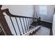 Carpeted staircase features dark wood railing and stair treads with white risers at 2845 Jims Ne Rd, Marietta, GA 30066