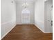 Well-lit dining room with wood floors and chandelier at 123 Laurel Springs Dr, Mcdonough, GA 30253