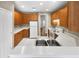 Functional kitchen with white countertops and wood cabinets at 123 Laurel Springs Dr, Mcdonough, GA 30253