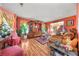 Inviting living room with hardwood floors, elegant furnishings, and a cozy atmosphere at 2040 Winding Circle Trl, Fairburn, GA 30213