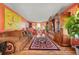 Comfortable living room with colorful walls, stylish decor, and beautiful hardwood flooring at 2040 Winding Circle Trl, Fairburn, GA 30213