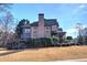 Beautiful two-story brick home with a well-manicured lawn and mature landscaping at 3759 Maryhill Nw Ln, Kennesaw, GA 30152