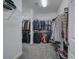 This walk-in closet is well-organized with racks and shelves to neatly store your shoes and clothing at 3759 Maryhill Nw Ln, Kennesaw, GA 30152