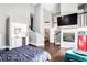 Bedroom featuring hardwood flooring, a fireplace, and second-story views at 409 Angier Ne Ct, Atlanta, GA 30312