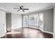 Bedroom featuring a large bay window and hardwood floors at 409 Angier Ne Ct, Atlanta, GA 30312