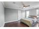 Bedroom showcasing hardwood floors, a ceiling fan, and natural light at 409 Angier Ne Ct, Atlanta, GA 30312