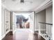 Hallway with french doors that lead to balcony views at 409 Angier Ne Ct, Atlanta, GA 30312