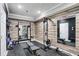 Well-equipped home gym featuring mirrors, weights, and training equipment for fitness enthusiasts at 409 Angier Ne Ct, Atlanta, GA 30312