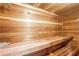 Relaxing sauna with wooden bench seating, wood paneled walls and ceiling at 409 Angier Ne Ct, Atlanta, GA 30312