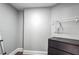 Bright walk-in closet featuring a wire shelf and dark wood dresser at 409 Angier Ne Ct, Atlanta, GA 30312