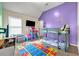 bedroom with a bunk bed, colorful rug, and a TV, perfect for play and rest at 5113 Rapahoe Trl, Atlanta, GA 30339