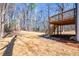 Expansive backyard with deck and wooden railing, perfect for outdoor relaxation at 526 Myrtle St, Villa Rica, GA 30180