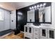 Modern bathroom featuring dual vessel sinks, a walk-in shower, and sleek fixtures at 526 Myrtle St, Villa Rica, GA 30180