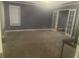 Primary bedroom with gray walls, neutral carpet and french doors at 2431 Weatherstone Se Cir, Conyers, GA 30094