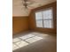 Bedroom featuring a large window for natural light, ceiling fan, and carpet at 2431 Weatherstone Se Cir, Conyers, GA 30094