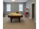 Large recreation room featuring a pool table and vintage popcorn machine at 2431 Weatherstone Se Cir, Conyers, GA 30094