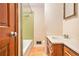 Cozy bathroom with tiled shower, wood floors, and updated fixtures at 2657 Langland Ne Ct, Atlanta, GA 30345