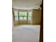 Bedroom with windows and plush carpet, offering a cozy retreat at 2657 Langland Ne Ct, Atlanta, GA 30345