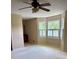 Bedroom with windows and plush carpet, offering a cozy retreat at 2657 Langland Ne Ct, Atlanta, GA 30345