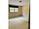 Bedroom with carpet and natural light coming through the window at 2657 Langland Ne Ct, Atlanta, GA 30345