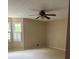 Bedroom with windows and plush carpet, offering a cozy retreat at 2657 Langland Ne Ct, Atlanta, GA 30345