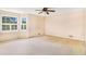 Bright bedroom featuring large windows with shutters and neutral-toned walls at 2657 Langland Ne Ct, Atlanta, GA 30345