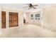 Spacious bedroom with large windows, closet doors, and access to an ensuite bathroom at 2657 Langland Ne Ct, Atlanta, GA 30345
