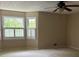 Bedroom with windows and plush carpet, offering a cozy retreat at 2657 Langland Ne Ct, Atlanta, GA 30345