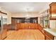 Open dining room with hardwood floors, chandelier and bar access at 2657 Langland Ne Ct, Atlanta, GA 30345