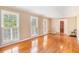 Bright living room boasts hardwood floors and lots of natural light from large windows at 2657 Langland Ne Ct, Atlanta, GA 30345