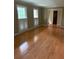 Living room with hardwood floors and windows, providing natural light and a welcoming space at 2657 Langland Ne Ct, Atlanta, GA 30345