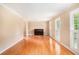 Bright living room boasts hardwood floors and lots of natural light from large windows at 2657 Langland Ne Ct, Atlanta, GA 30345
