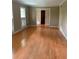 Living room with hardwood floors and windows, providing natural light and a welcoming space at 2657 Langland Ne Ct, Atlanta, GA 30345